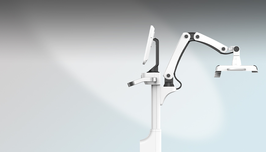 Free-adjustable articulated arm system
